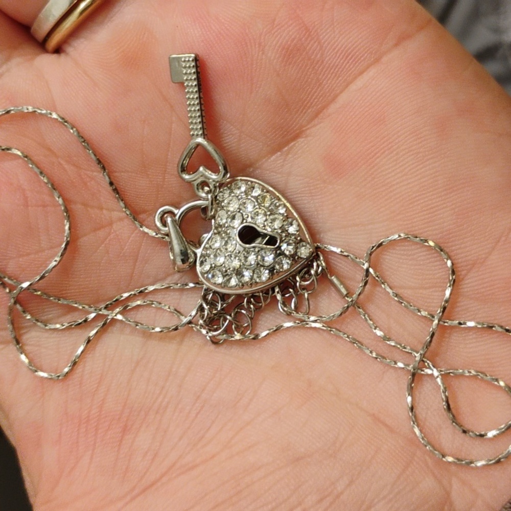 Silver tone heart lock and key necklace
